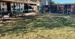 Business Opportunity with Large Shop and 1.4 Acres