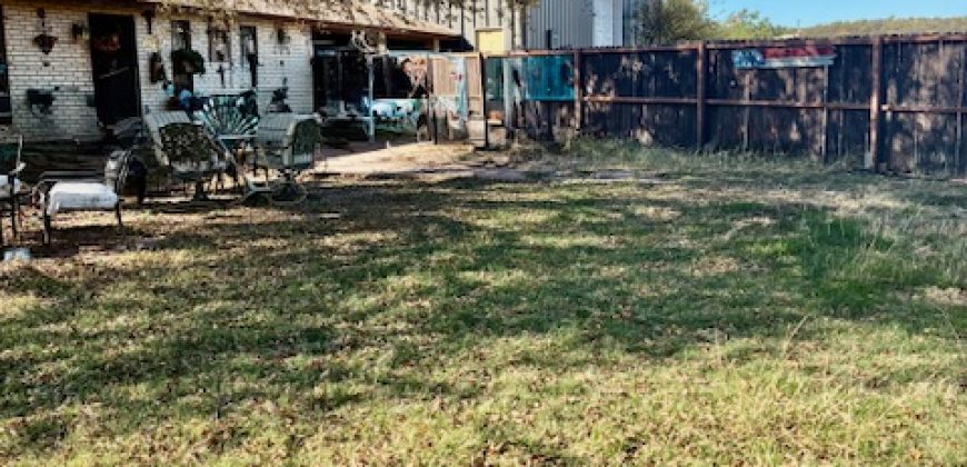 Business Opportunity with Large Shop and 1.4 Acres