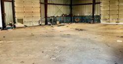 Business Opportunity with Large Shop and 1.4 Acres